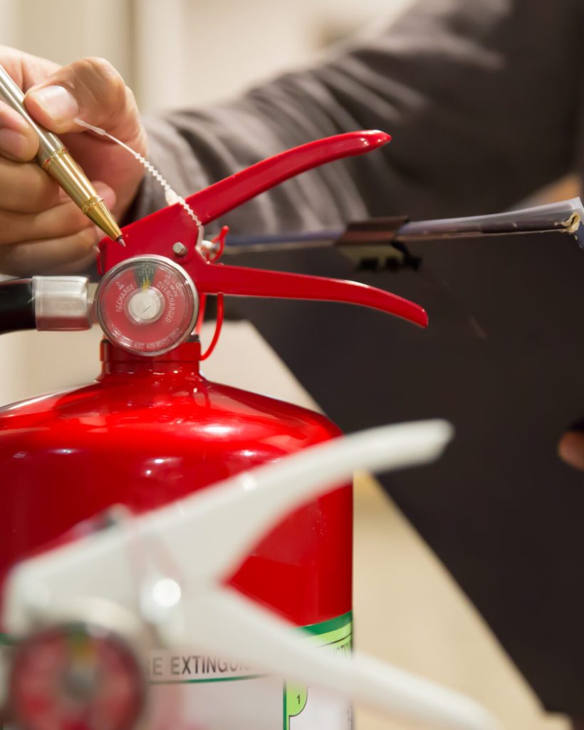 Fire extinguishers, Engineers are checking fire extinguishers.